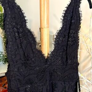 Lulu’s L beautiful extreme V black lace dress, zip up back, fully lined to knee.